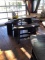 Triangle bar height table with lazy Susan glass center. With benches
