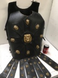 Medieval warrior vest with gold finish accents. Adult. Fits most