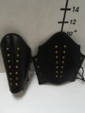 New pair leather like adult size bracers