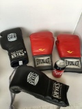 2 sets of boxing gloves