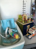 Lot. Baby bath, toy activity center, kite, ambulance toy car