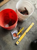 Orange and white bucket with tools, straps,etc