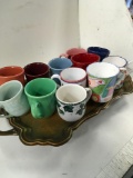 12 assorted coffee cups. Some are stamped see pics