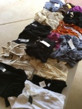 16 pieces. New with tags Assorted woman's blouses, Tang tops, Camisoles etc. XL, M, L, 1XL,