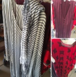 9 pieces. Assorted woman's clothing. L, Tunics seem to be L/XL