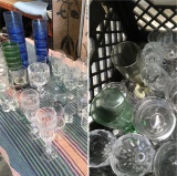 Three crates of assorted glass and plastic items