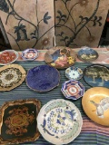 12 pieces. Assorted collectible/ decorative plates.