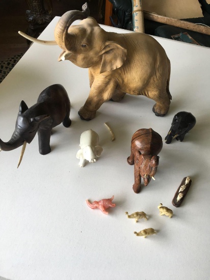10 assorted elephant figurines. Wood, 1) Lenox porcelain 1) made in Italy broken tusk, etc