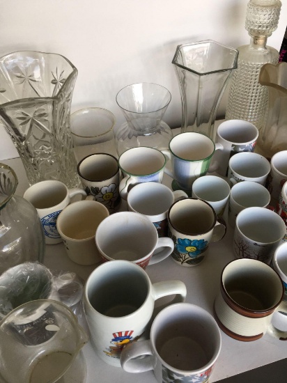 Lot. Assorted coffee mugs, glass pitcher, vases, etc