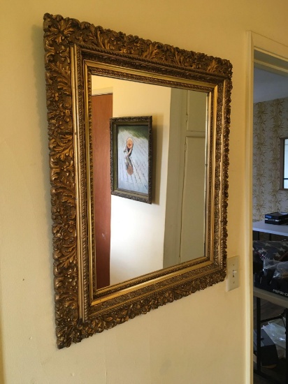 Framed wall mirror 27" x 24"