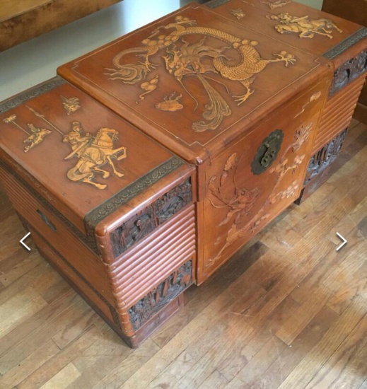 Hand carved, vintage Oriental chest with metal accents & (3) blankets/quilts