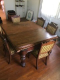7 piece. Vintage dinning table and chairs on casters.