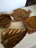 7 pieces. Wood Serving dishes/ bowls and 4 Monkeypod wood Hawaii dishes