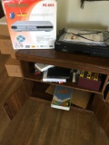 Storage cabinet, Samsung DVD V8900, new Proctron PD-800 DVD/CD player, assorted VHS movies