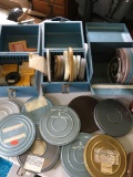 Camera Equip. Vintage movie reel chests with assorted used film