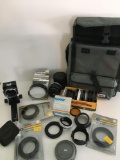 Camera Equip. Assorted camera lenses, accessories & bag