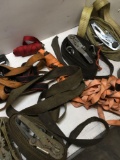 9 pieces. Assorted tie downs/ parts