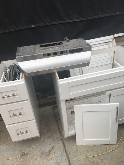 Lot miscellaneous cabinets, Kenmore hood, faucet parts, etc