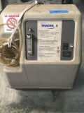 Invacare 5 portable oxygen concentrator . Turned on