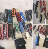 Group of 28 Assorted Knives & Multi Tools