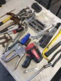 Grouping of assorted tools, stapler, hammers etc.