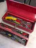 Metal tool box with assorted tools