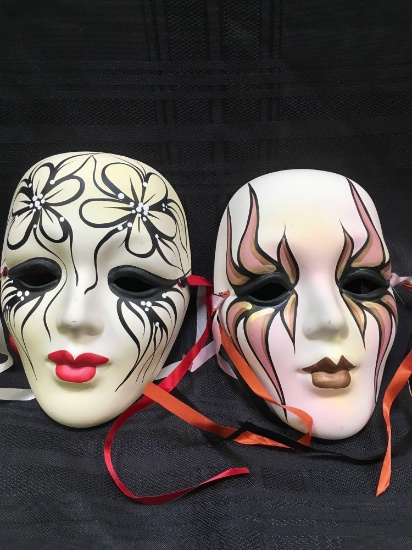 7" ceramic wall masks. Both signed in the back, see pictures