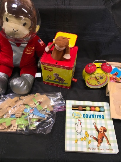 Lot. Curious George toys. Doll, clock, puzzles, book, tin musical Jack in the box. 6 pieces