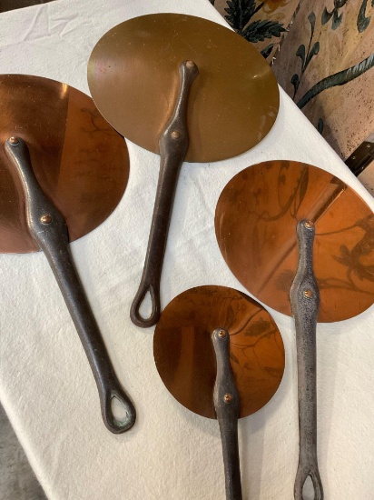 Vintage copper lids with iron handle. 1) 10" 1) 9" 1) 8" 1) 5". Measurements do not include handle.