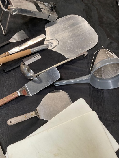 Lot of assorted kitchenware, Matfep slicer, Pizza peel, China cap, Spatulas, Cutting boards etc.