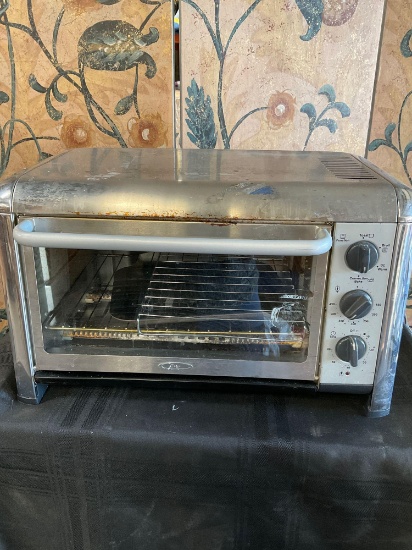 Oster oven . Turned on
