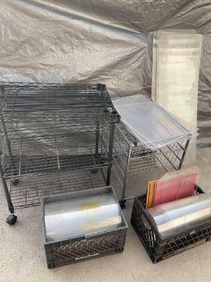 Lot. Rolling racks, plastic shelf protectors, crates, plexiglass pieces.