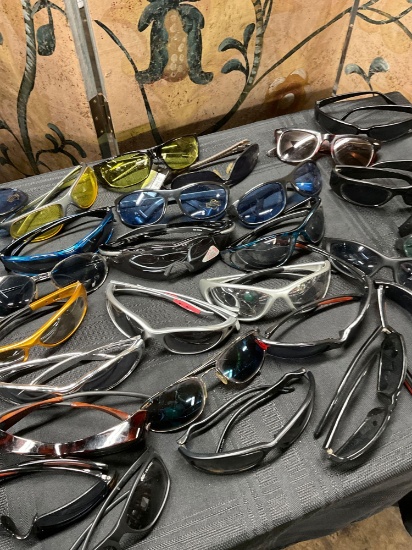 Assorted new sunglasses. 30 pieces