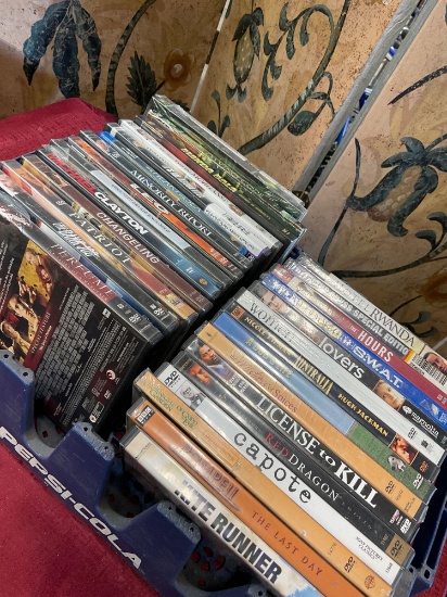 Assorted new and used DVDs. 30 pieces