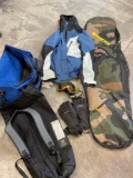Assorted items. Ride snowboard bag, AK Burton M jacket, Dakine M gloves, goggles, 2 bags