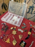 Assorted custom jewelry. Pins, earrings, bracelets, watch, etc. 23 pieces 1) Rubbermaid box