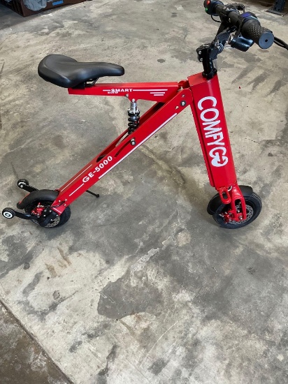 Red, open box Comfy Go GE-5000 scooter. Light & horn work. Comes with charger and keys