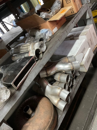 Exhaust parts, hangers tips, crossovers. Majority are new. Over 20 pieces