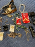 Assorted items. Custom jewelry, phone chargers, belt, belt buckle, etc