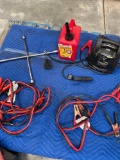 Car accessories. Gasoline container, power station, 4 way cross wrench, booster cables. 5 pieces