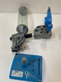 Dillon Precision parts. Stand, tool head & powder measurer