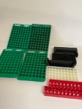 Four RCBS loading blocks, six assorted cartridge holders. 10 pieces