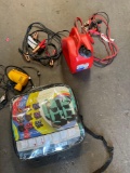 Car parts/ accessories. 2 gallon gasoline container, pump, seat cover, jumper cables. 5 pieces