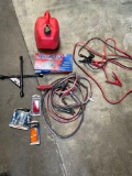 Car accessories. 2 gallon gasoline container, wrench, jumper cables, lights. 8 pieces