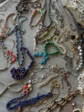 Assorted costume jewelry necklaces. 55 pieces