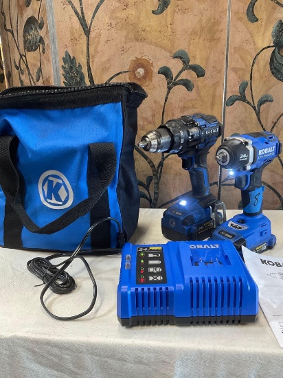 Kobalt impact drills, charger station, two batteries, bag. Turned on WORKS