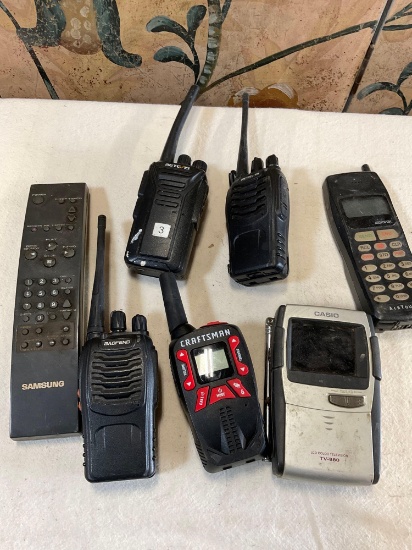 Grouping of electronic items, Walkie talkies, cell phone, radio, remote control, 7 pieces