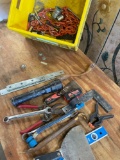 Assorted tools and chain.