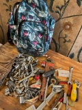 Vans backpack and assorted tools