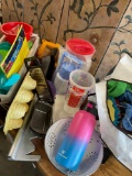 Assorted kitchen items, toys, towels